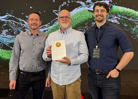 AWARD PRESENTED TO MOWER MAGIC